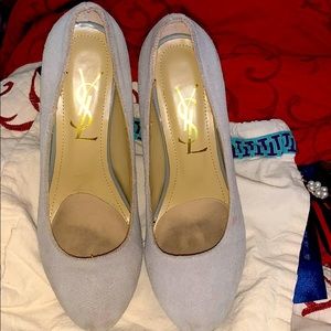 Beautiful suede YSL heels .